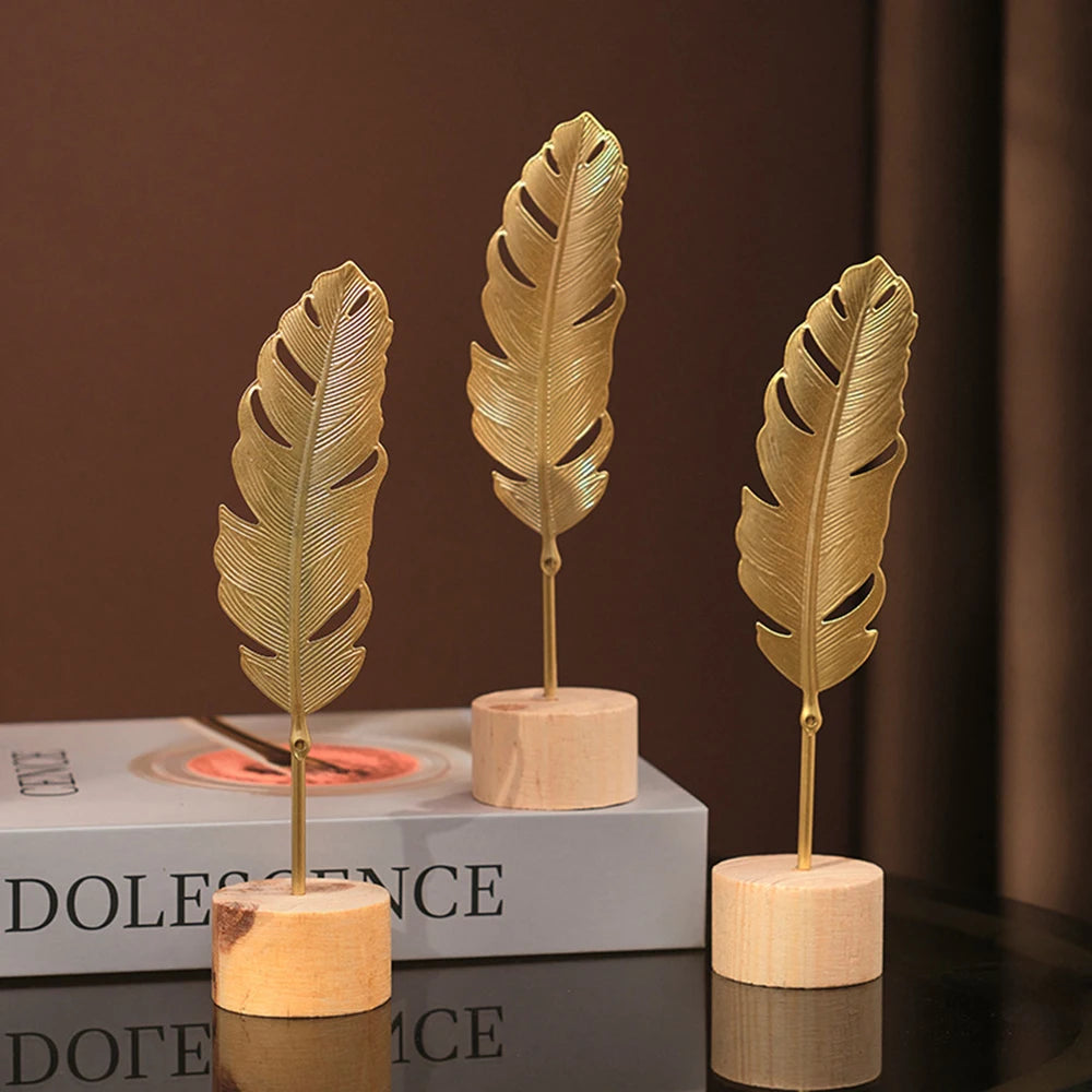 Modern Luxury Decor: Gold Metal Leaf & Feather Sculpture with Wood Base